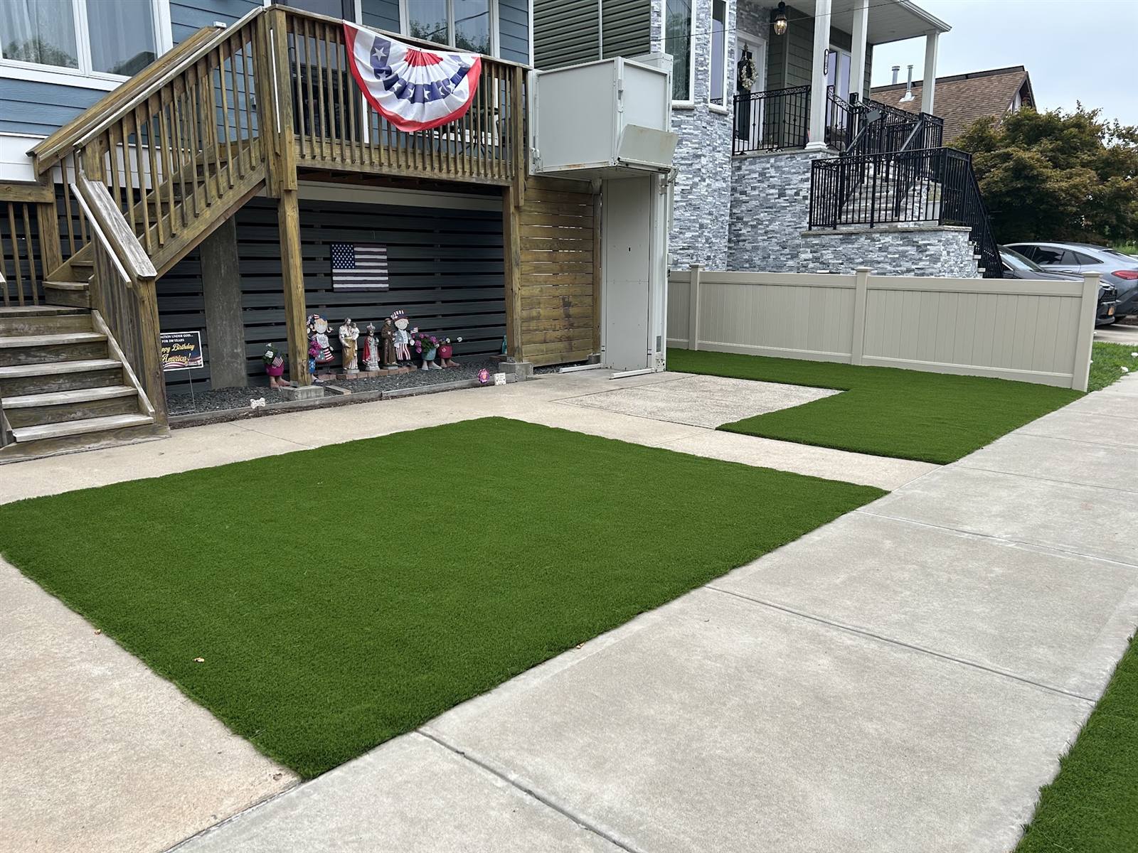 Synthetic turf lawn sections and walkways installed by Turf Boss Construction in New Jersey