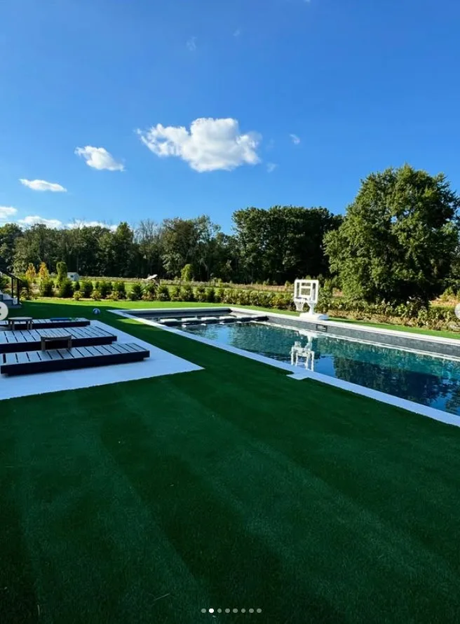 Poolside synthetic turf retreat by Turf Boss Construction NJ