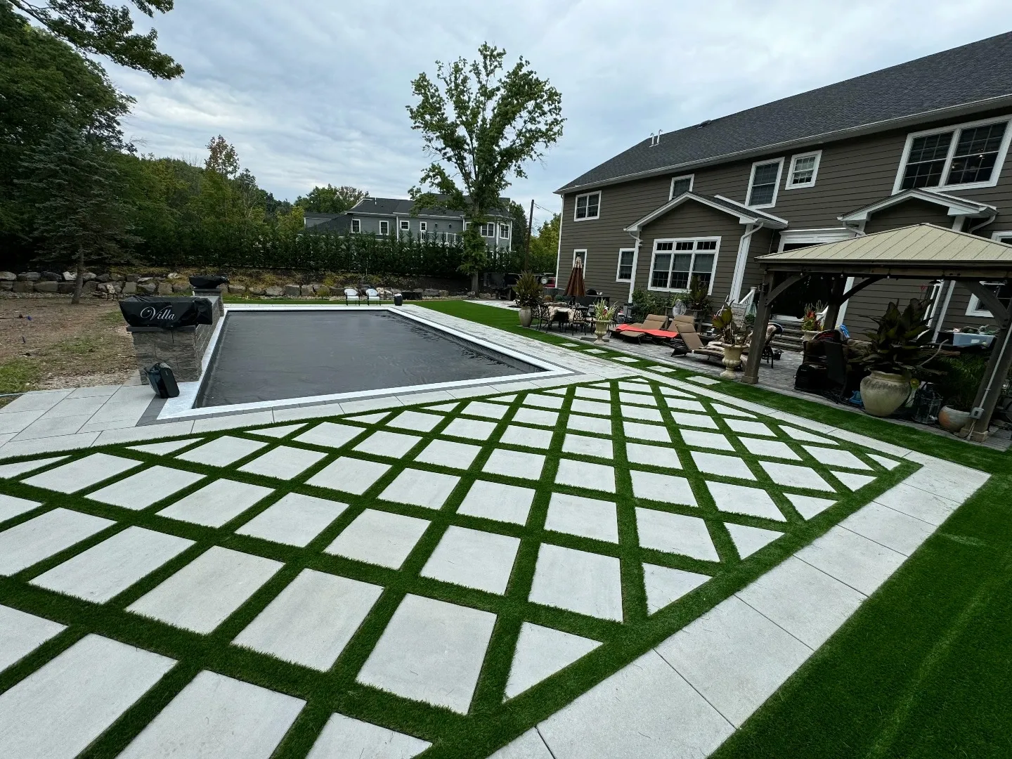 Paver and turf grid pool deck in Old Bridge NJ